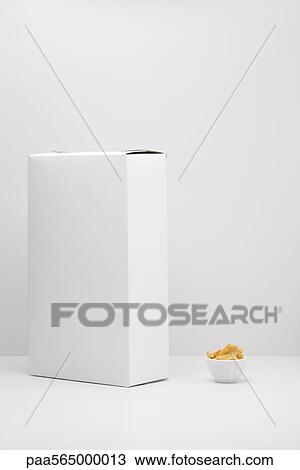 White cereal box and small bowl of cereal View Large Photo Image Stock Image - White cereal box and small bowl of cereal. Fotosearch