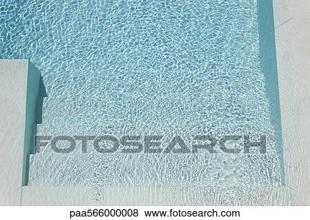 Stock Photo - Steps in swimming pool, overhead view. Fotosearch