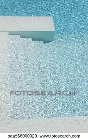 Steps leading down into swimming pool View Large Photo Image Stock Photo - Steps leading down into swimming pool. Fotosearch