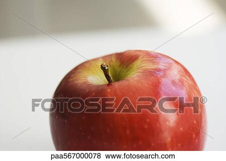 Stock Photo - Red apple, close-up. Fotosearch