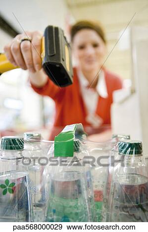 Cashier scanning bar code View Large Photo Image Stock Photo - Cashier scanning bar code. Fotosearch