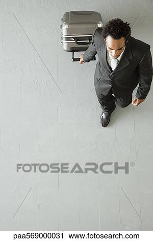 Businessman traveling for business View Large Photo Image Stock Image - Businessman traveling for business. Fotosearch