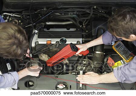Stock Photography - Calibrating engine timing. Fotosearch