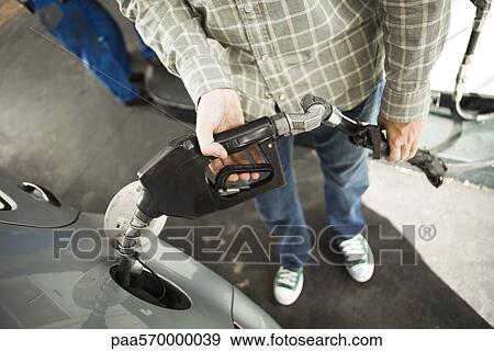 Refueling at gas station View Large Photo Image Stock Photo - Refueling at gas station. Fotosearch