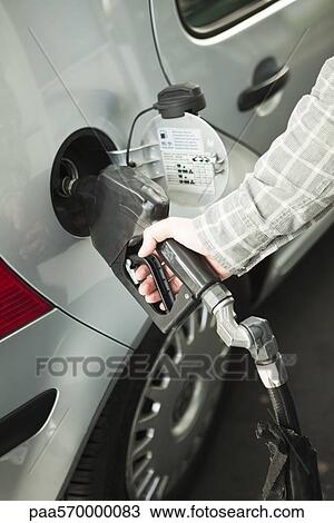 Refueling car at gas station View Large Photo Image Stock Image - Refueling car at gas station. Fotosearch