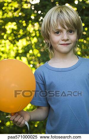 Boy with balloon, portrait View Large Photo Image Stock Photography - Boy with balloon, portrait. Fotosearch