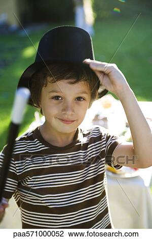 Boy with magic wand and magician's hat, portrait View Large Photo Image Stock Image - Boy with magic wand and magician's hat, portrait. Fotosearch