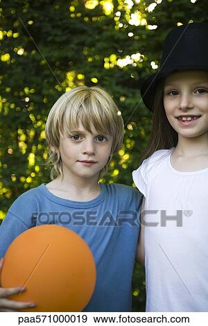 Stock Photo - Childhood friends, portrait. Fotosearch