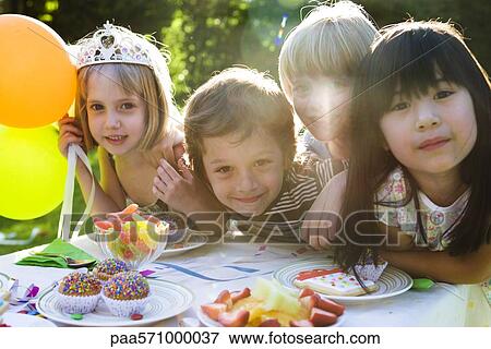 Children at birthday party View Large Photo Image Stock Photo - Children at birthday party. Fotosearch