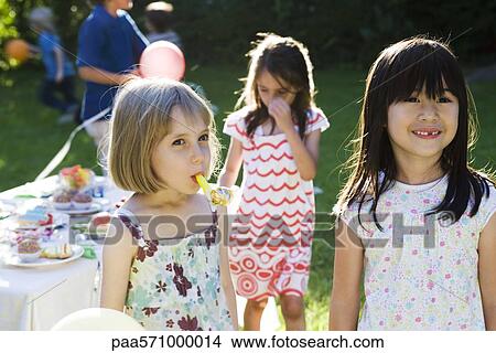 Children at outdoor party View Large Photo Image Picture - Children at outdoor party. Fotosearch