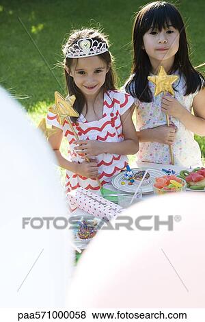 Girls in costume at outdoor party View Large Photo Image Stock Photo - Girls in costume at outdoor party. Fotosearch