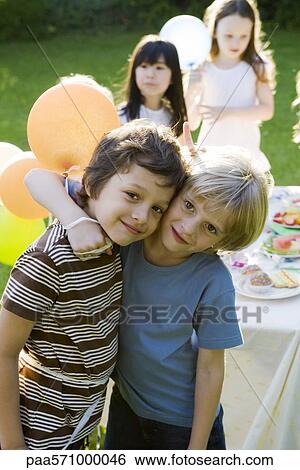 Young friends together at outdoor party, portrait View Large Photo Image Stock Photograph - Young friends together at outdoor party, portrait. Fotosearch