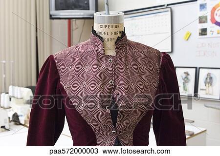 Stock Image - Dress on dressmaker's form. Fotosearch