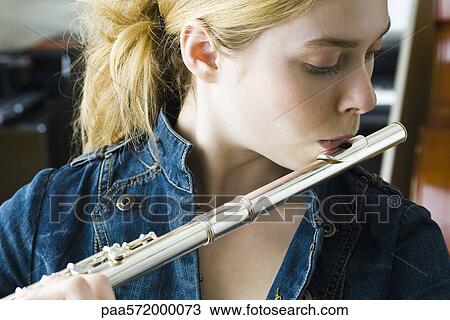Flautist practicing View Large Photo Image Stock Image - Flautist practicing. Fotosearch