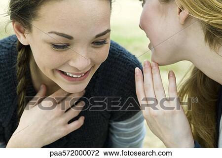 Friends gossiping View Large Photo Image Stock Image - Friends gossiping. Fotosearch