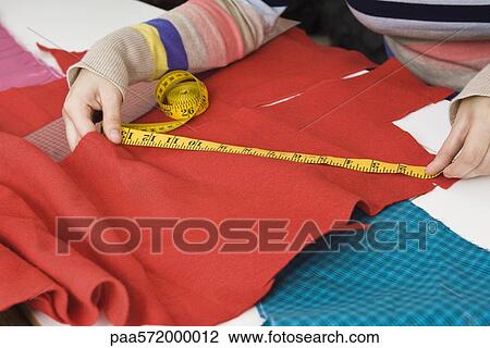 Measuring fabric View Large Photo Image Stock Image - Measuring fabric. Fotosearch