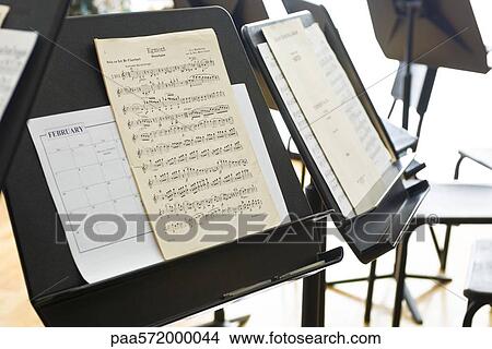 Sheet music on music stand View Large Photo Image Picture - Sheet music on music stand. Fotosearch
