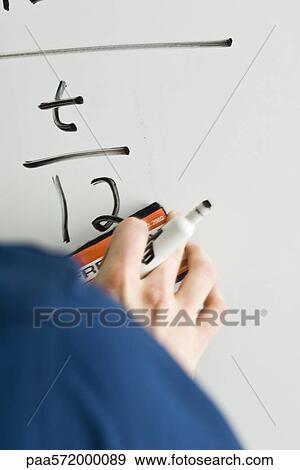 Stock Photo - Writing equation on whiteboard. Fotosearch