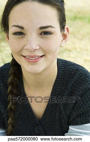 Young woman, portrait View Large Photo Image Stock Image - Young woman, portrait. Fotosearch