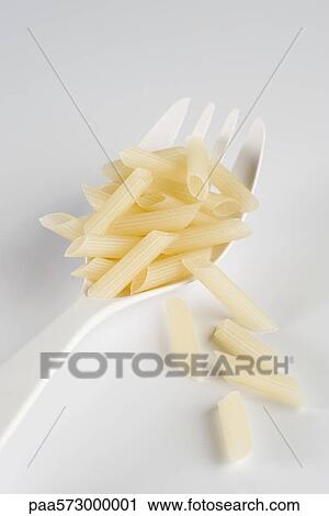 Gluten-free penne pasta made from rice View Large Photo Image Stock Image - Gluten-free penne pasta made from rice. Fotosearch