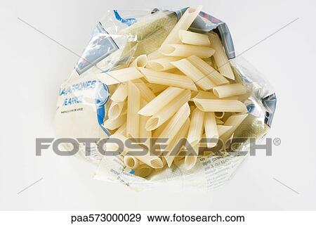Gluten-free penne pasta made from rice View Large Photo Image Stock Photo - Gluten-free penne pasta made from rice. Fotosearch