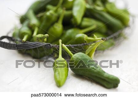 Green chili peppers View Large Photo Image Picture - Green chili peppers. Fotosearch