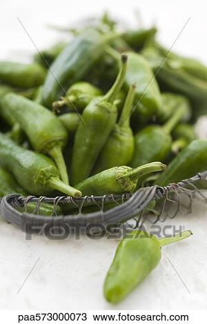 Stock Image - Green chili peppers. Fotosearch
