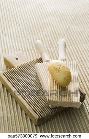 Potato and gnocchi boards View Large Photo Image Stock Photo - Potato and gnocchi boards. Fotosearch