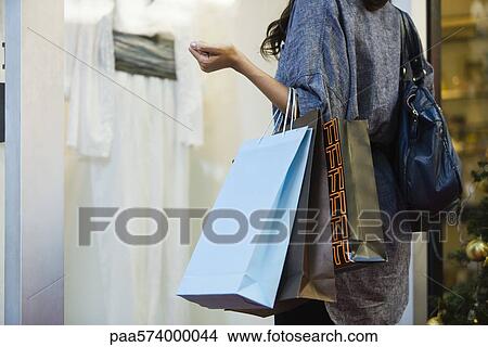 Window shopping View Large Photo Image Picture - Window shopping. Fotosearch