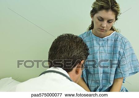 Female patient waiting for doctor's diagnosis View Large Photo Image Stock Photo - Female patient waiting for doctor's diagnosis. Fotosearch