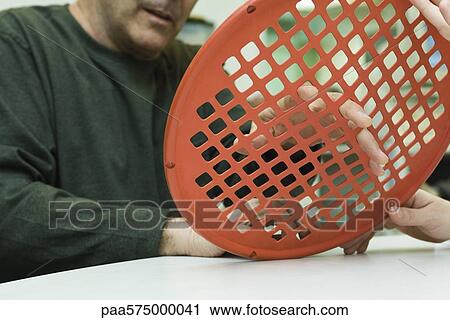 Patient using hand exercise web for occupational therapy treatment View Large Photo Image Stock Image - Patient using hand exercise web for occupational therapy treatment. Fotosearch