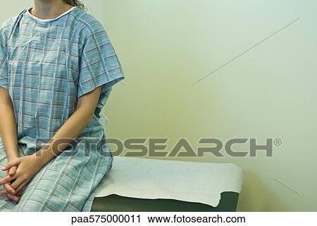 Patient waiting on examination table View Large Photo Image Stock Image - Patient waiting on examination table. Fotosearch