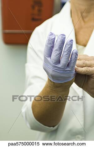 Taking off disposable latex glove View Large Photo Image Stock Photography - Taking off disposable latex glove. Fotosearch