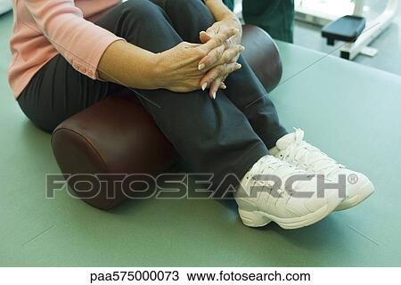 Using exercise cushion for leg stretch exercise View Large Photo Image Stock Image - Using exercise cushion for leg stretch exercise. Fotosearch