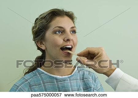 Woman undergoing medical exam View Large Photo Image Stock Photo - Woman undergoing medical exam. Fotosearch