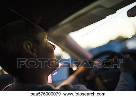 Driving at dusk, silhouette View Large Photo Image Stock Photo - Driving at dusk, silhouette. Fotosearch