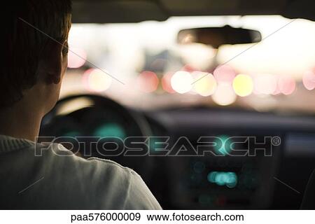Driving in rush hour traffic View Large Photo Image Stock Photo - Driving in rush hour traffic. Fotosearch