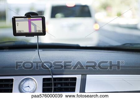 Driving with the assistance of GPS View Large Photo Image Stock Photo - Driving with the assistance of GPS. Fotosearch
