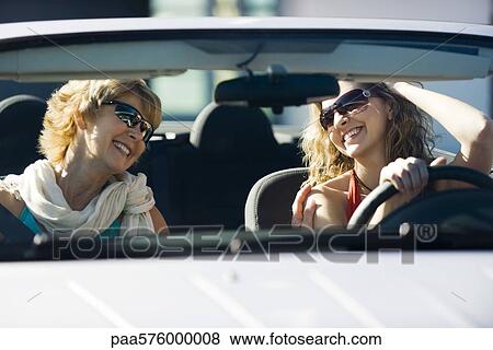 Mother and adult daughter out together in car View Large Photo Image Stock Photo - Mother and adult daughter out together in car. Fotosearch