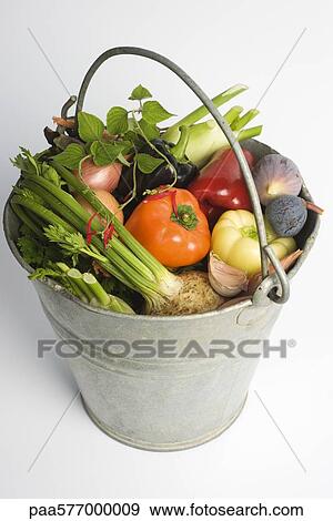 Bucket filled with assorted fresh vegetables View Large Photo Image Stock Photo - Bucket filled with assorted fresh vegetables. Fotosearch