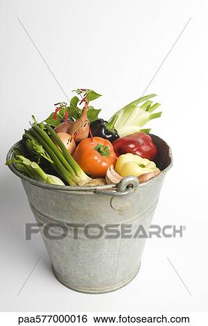 Bucket filled with assorted fresh vegetables View Large Photo Image Stock Photograph - Bucket filled with assorted fresh vegetables. Fotosearch