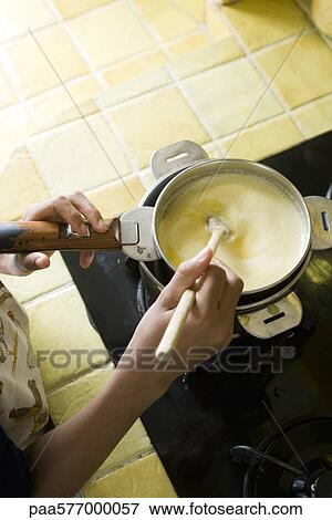 Cooking with double boiler View Large Photo Image Stock Photo - Cooking with double boiler. Fotosearch