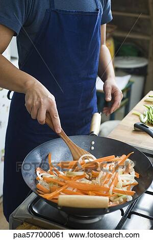 Stir-frying vegetables View Large Photo Image Stock Image - Stir-frying vegetables. Fotosearch
