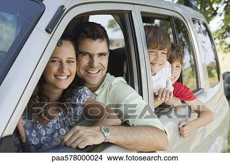Picture - Family in car, portrait. Fotosearch
