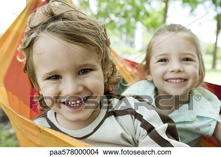 Picture - Young brother and sister, portrait. Fotosearch