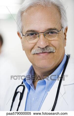 Doctor smiling, portrait View Large Photo Image Stock Photography - Doctor smiling, portrait. Fotosearch