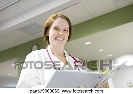 Female doctor, portrait View Large Photo Image Stock Image - Female doctor, portrait. Fotosearch