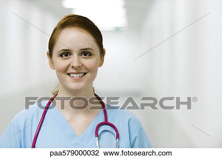 Nurse smiling, portrait View Large Photo Image Stock Image - Nurse smiling, portrait. Fotosearch