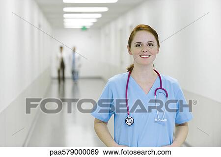 Nurse smiling, portrait View Large Photo Image Stock Photo - Nurse smiling, portrait. Fotosearch