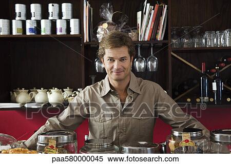 Stock Photography - Cafe owner, portrait. Fotosearch